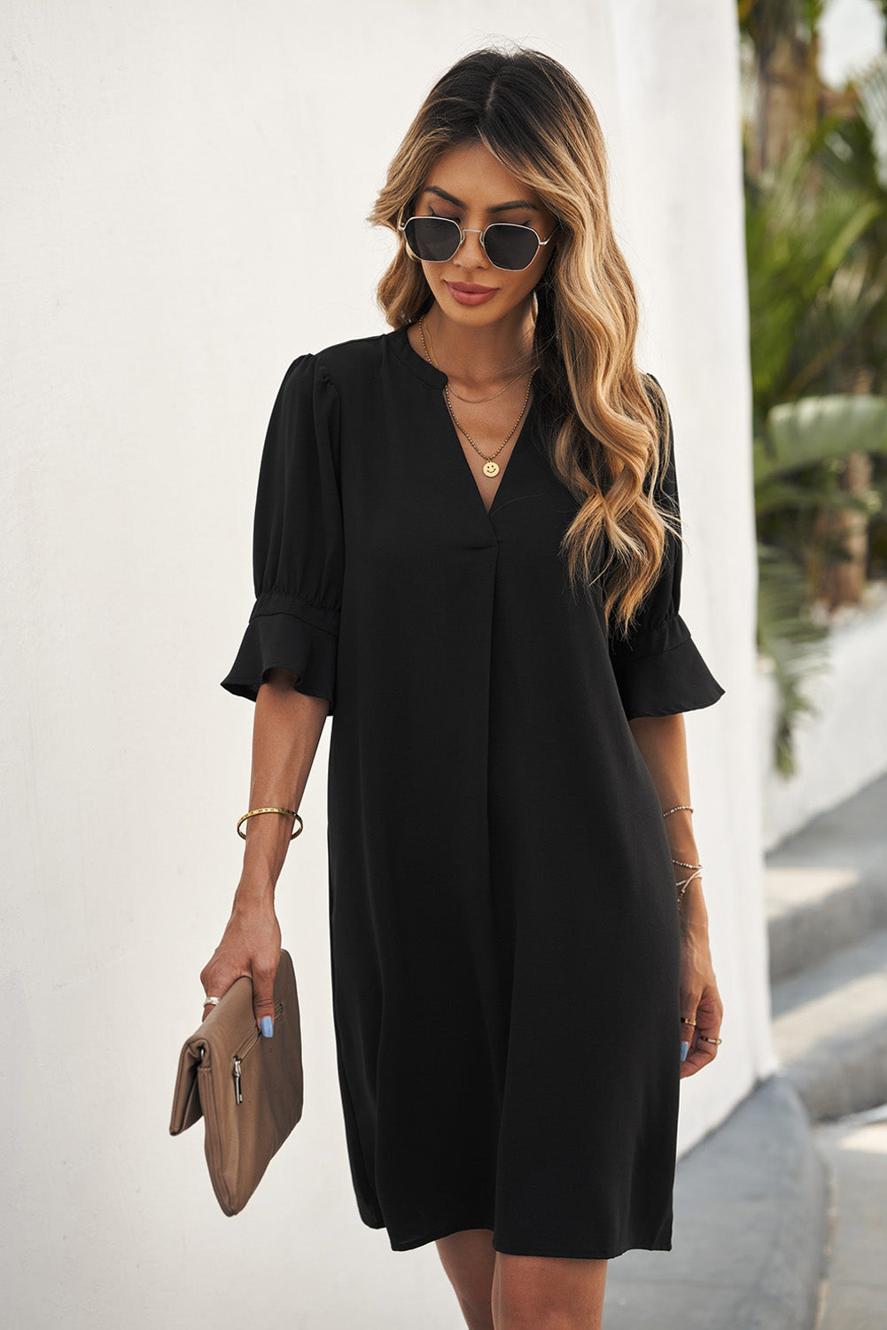 Black straight dress with ruffled sleeves