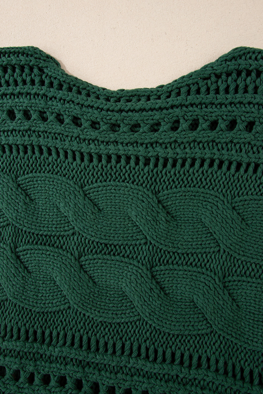 Pull court en tricot torsadé ajouré vert noirâtre