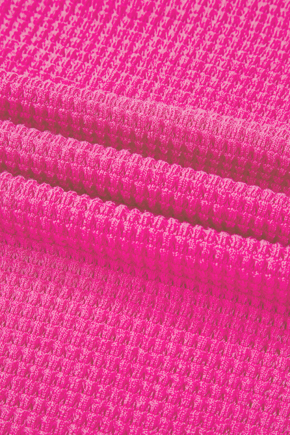 Haut ample à col en V et fentes latérales en tricot *