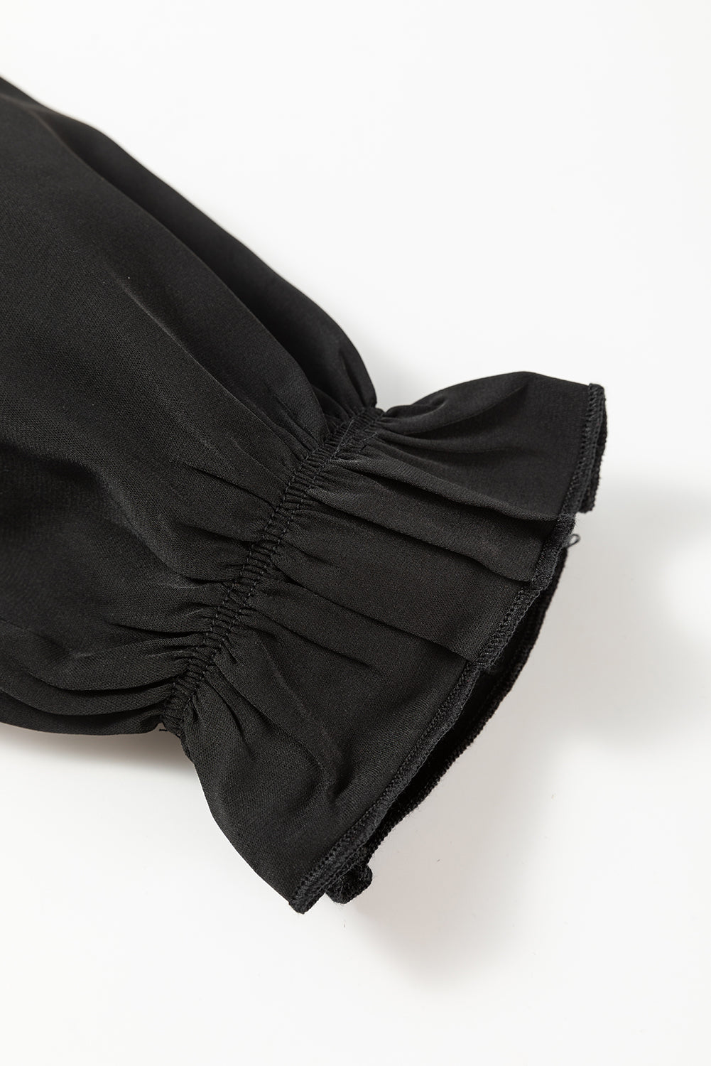 Chemisier à manches longues et à volants en maille léopard noir-A WOMAN WE LOVE