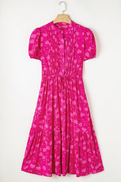 Mid-long pleated fluid dress with floral print and red tightening cord