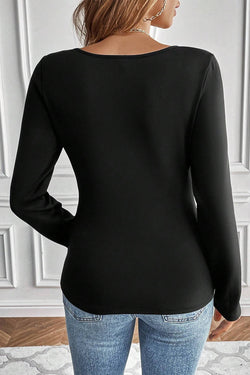 Unique black thermal high with cleared neckline, slim cut