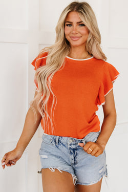 Knitted top with ruffled sleeves and contrasting trim in russet orange