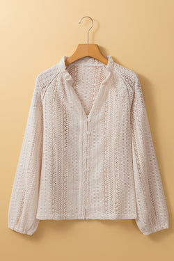 White buttoned shirt in openwork lace with puffy sleeves