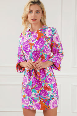 Purple floral dress with keyhole back and long sleeves with belt