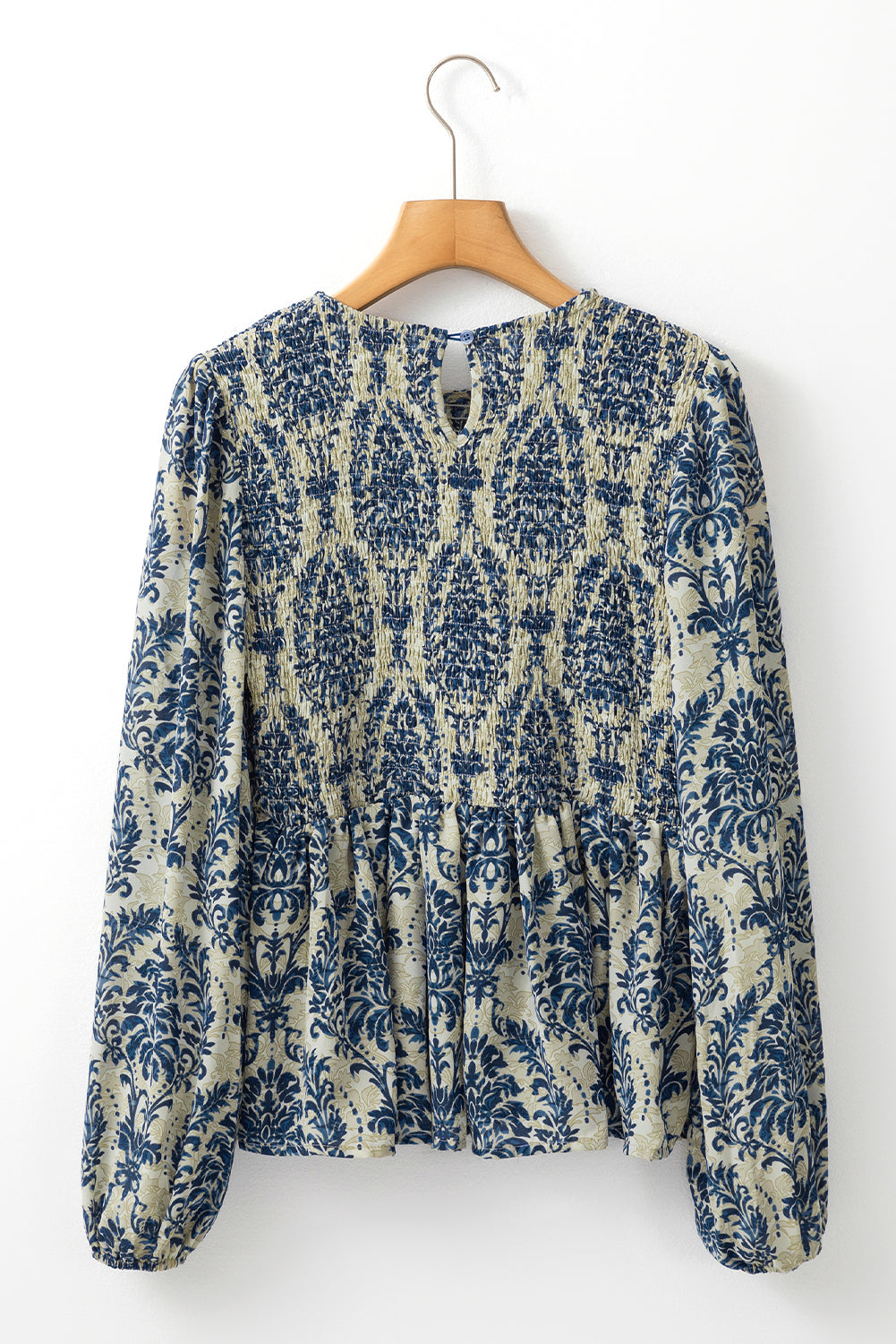 Chemisier péplum smocké à manches ballon *-A WOMAN WE LOVE