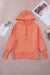 Henley orange hoodie with bat pockets and sleeves