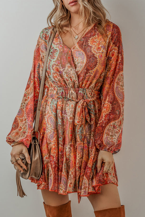 Orange bohemian paisley print mini dress with long sleeves and pleated belt