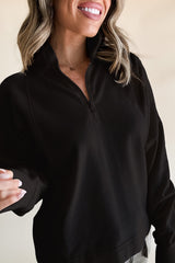 Sweat-shirt noir à col zippé et épaules tombantes