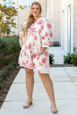 Mini dress with floral print with lace -ups and V -neck with large white balloon sleeves