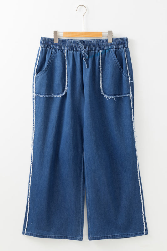 Pantalon ample grande taille en denim délavé bleu voile