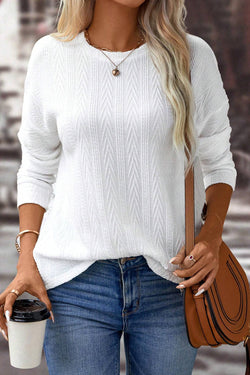 White textured knit top with crew neck and dropped shoulders