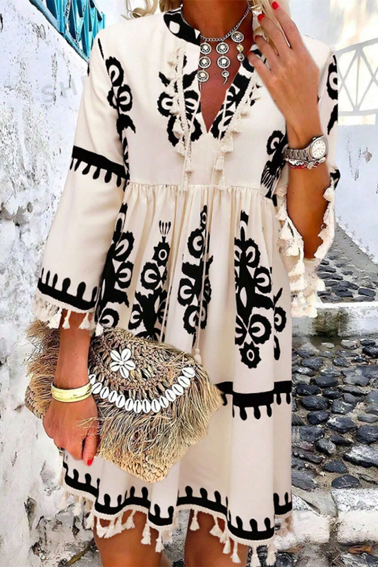 Beige V-neck mini dress with western pattern print tassels