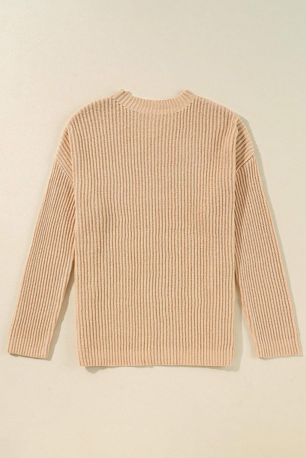 Pull ample en tricot torsadé abricot avec épaules tombantes et fentes latérales