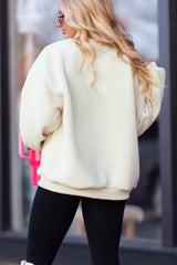 Sudadera sherpa howdy beige en parches