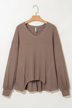 Long -sleeved loose blouse and V -winged V -neck collar