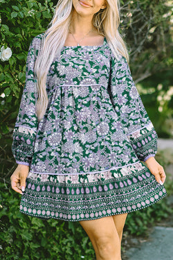 Green dress with floral print and border *