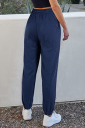 Pantalon de jogging bleu marine à la taille avec cordon de serrage et doublure en polaire de couleur unie