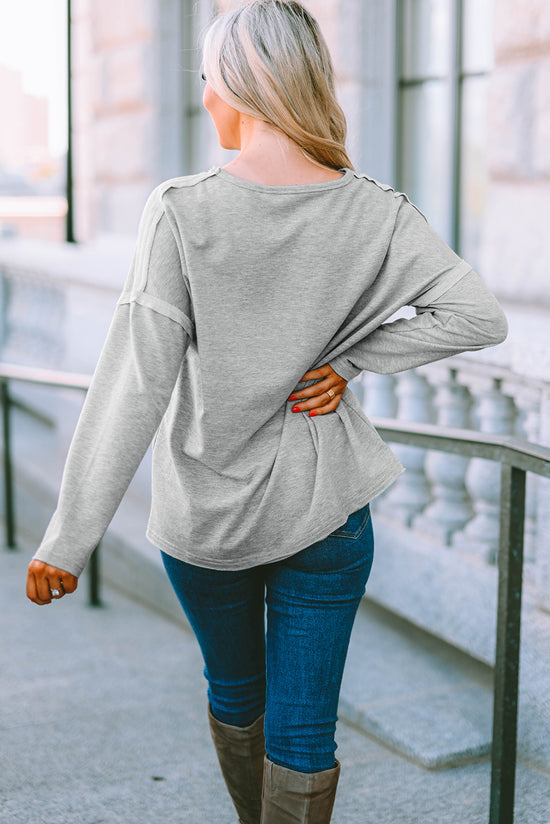 Grey oversized top with pockets and dropped sleeves