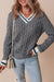 Cable knit v-neck sweater with contrasting ribbed cuffs in medium grey