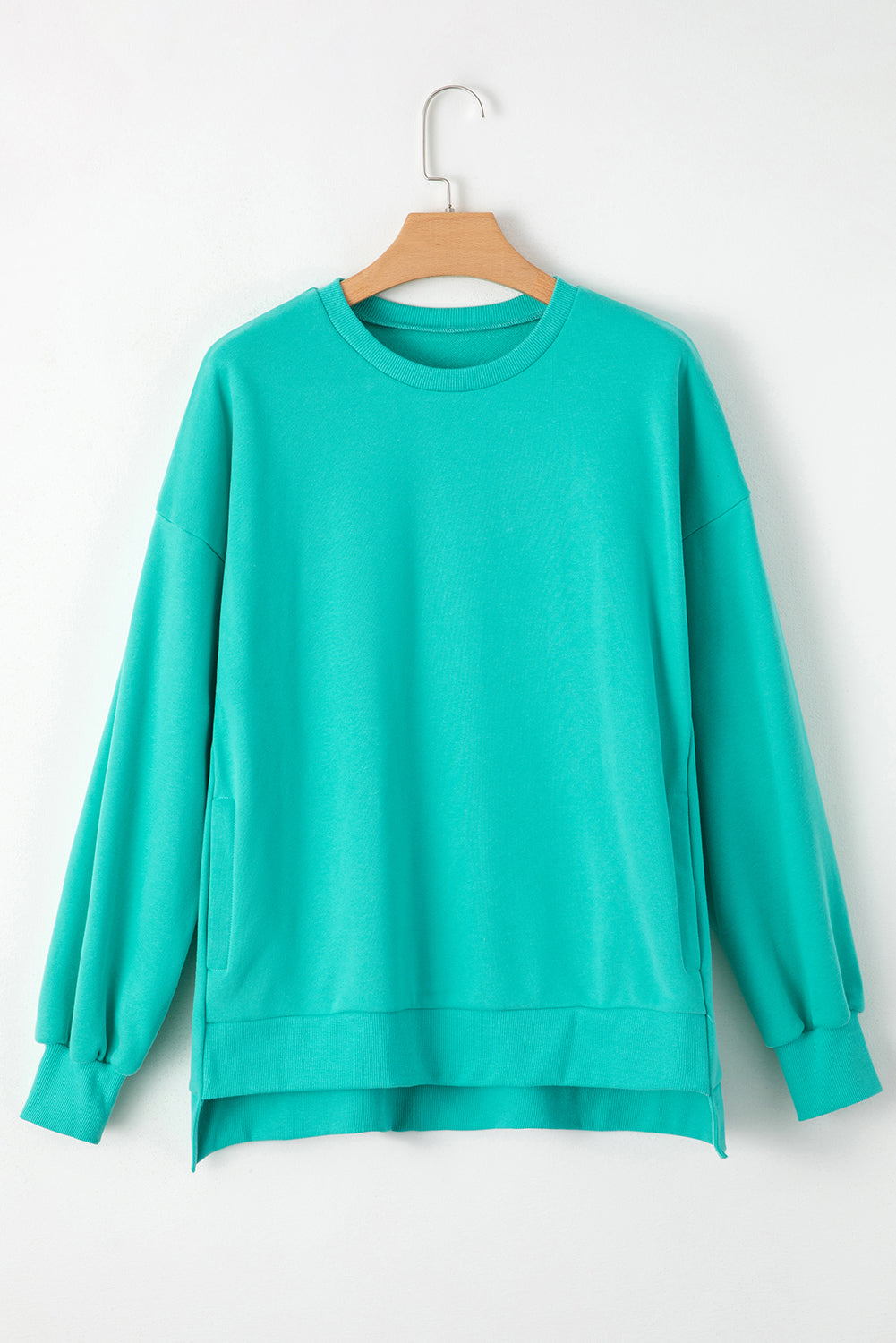 High-low drop-shoulder sweatshirt with solid fleece lining in sea green