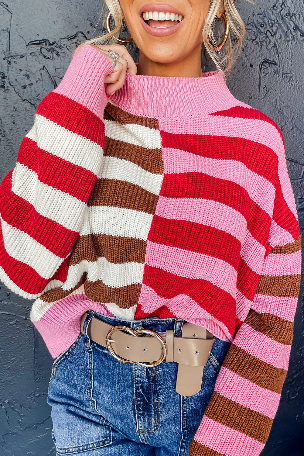 Loose-fitting striped color block sweater with high neck and dropped shoulders in pink