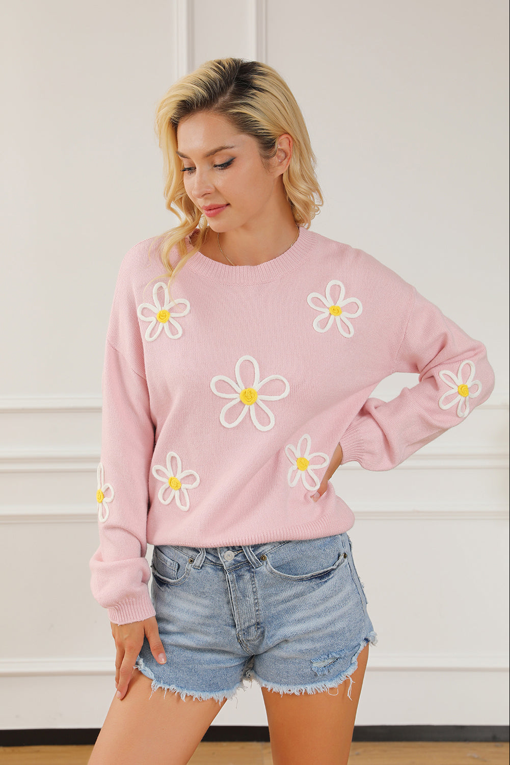 Pink chenille crew neck sweater with daisy stitching