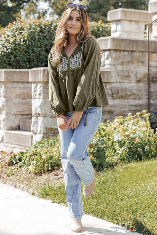 Ample pleated blouse with split and green spokes