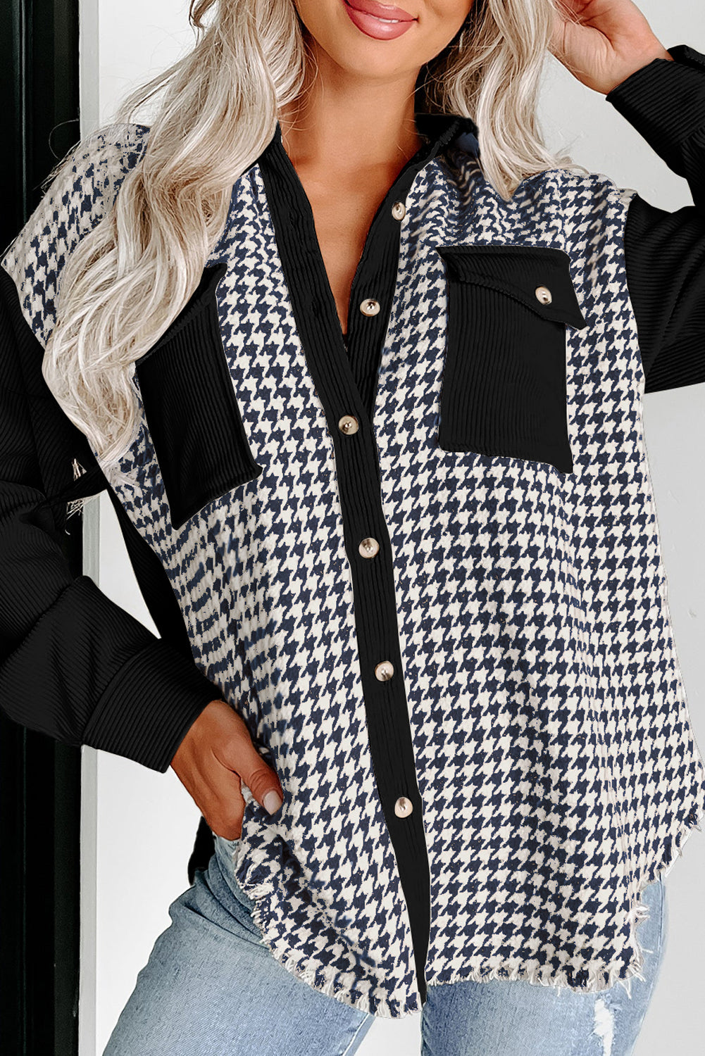 Short black jacket in ribbed velvet pied-de-poule *