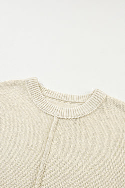 Tricotted sweater with short sleeves *