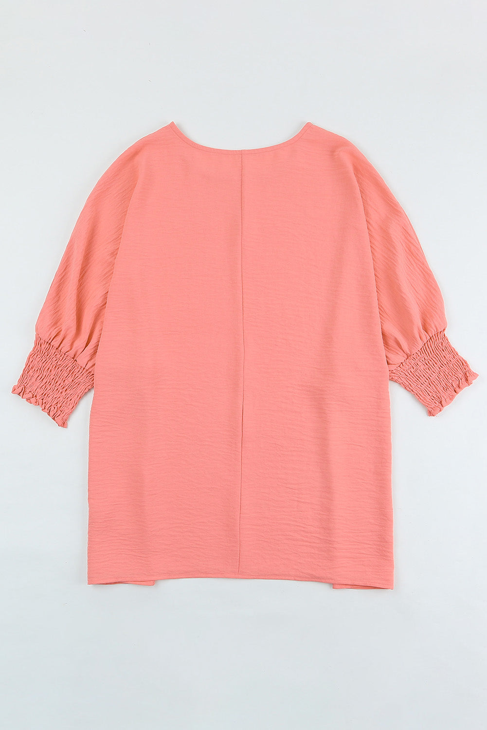 Top de poignet rose à la blouse rose