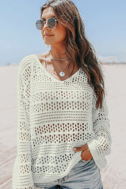 Pull blanc à col en V et crochet ajouré