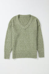 Pull ample à œillets vert jungle, col en V, épaules tombantes