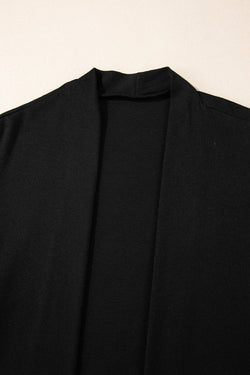 Cardigan negro abierto en la parte delantera *