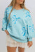 Over-dimensional sequined sweatshirt and butterfly knot with drooping shoulder