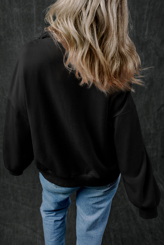 Black zip-up sweatshirt with stand-up collar and kangaroo pocket