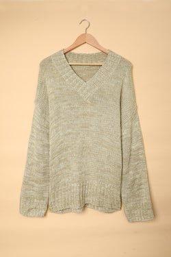 Grey V-neck knitted sweater with dropped shoulders