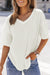 Ample white high in embossed knitting with drooping shoulders