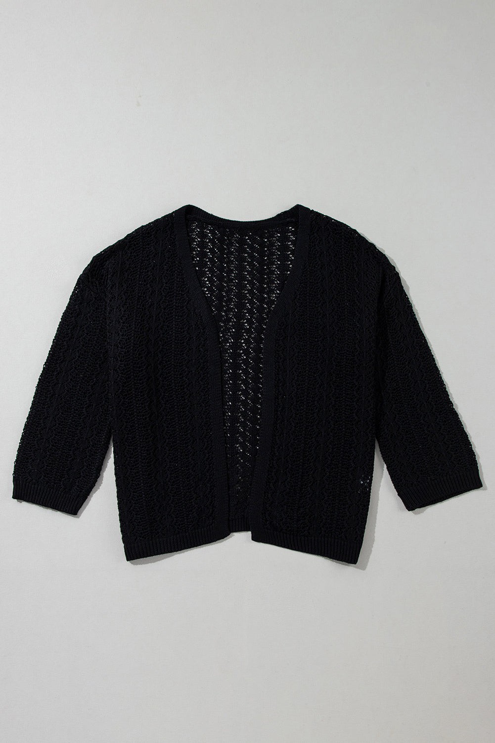 Black open front cardigan in openwork knit with dropped shoulders