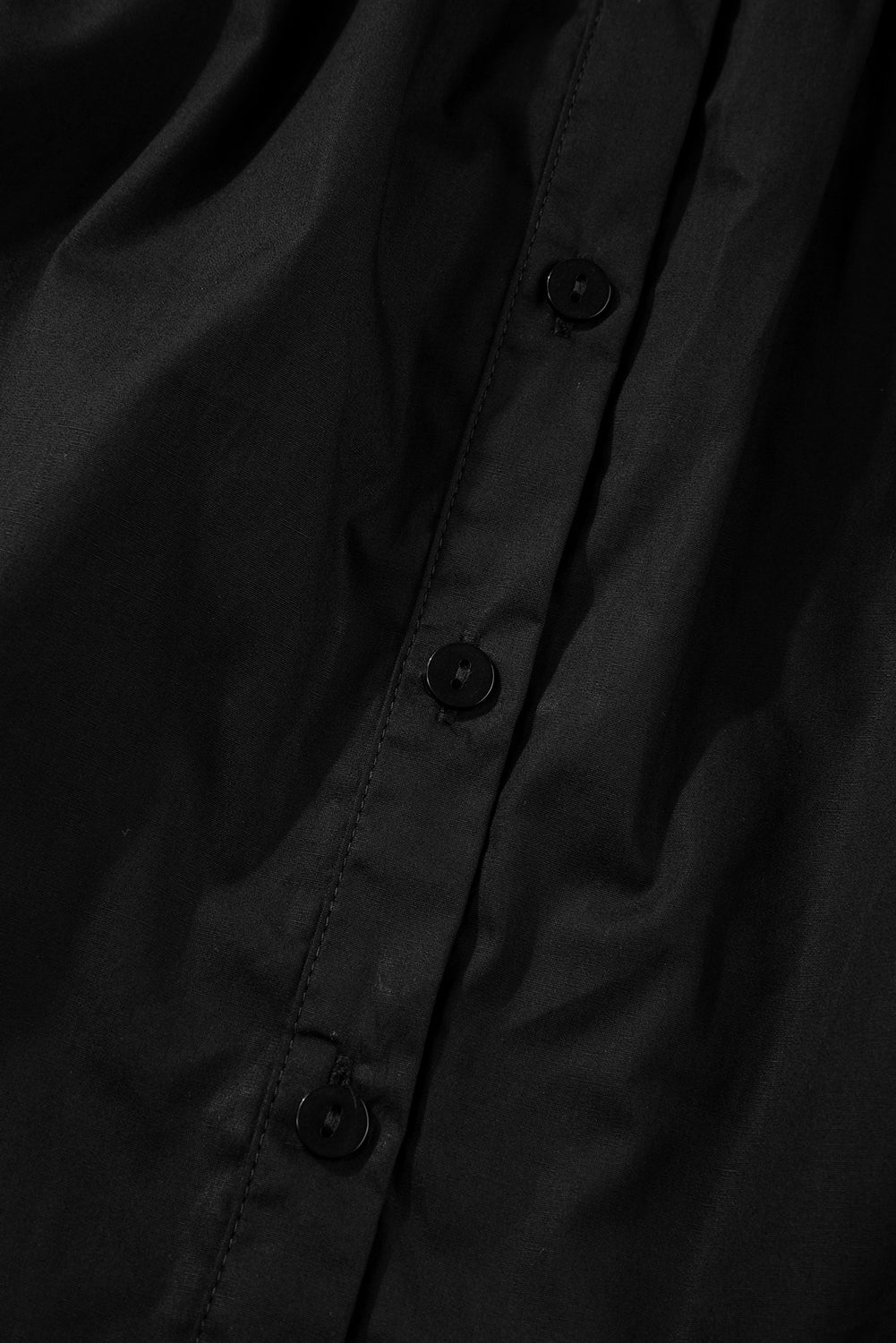 Chemise ample noire à manches bouffantes-A WOMAN WE LOVE