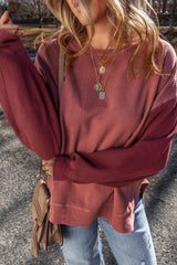 Sudadera de hombro caída en un mosaico rojo mineral