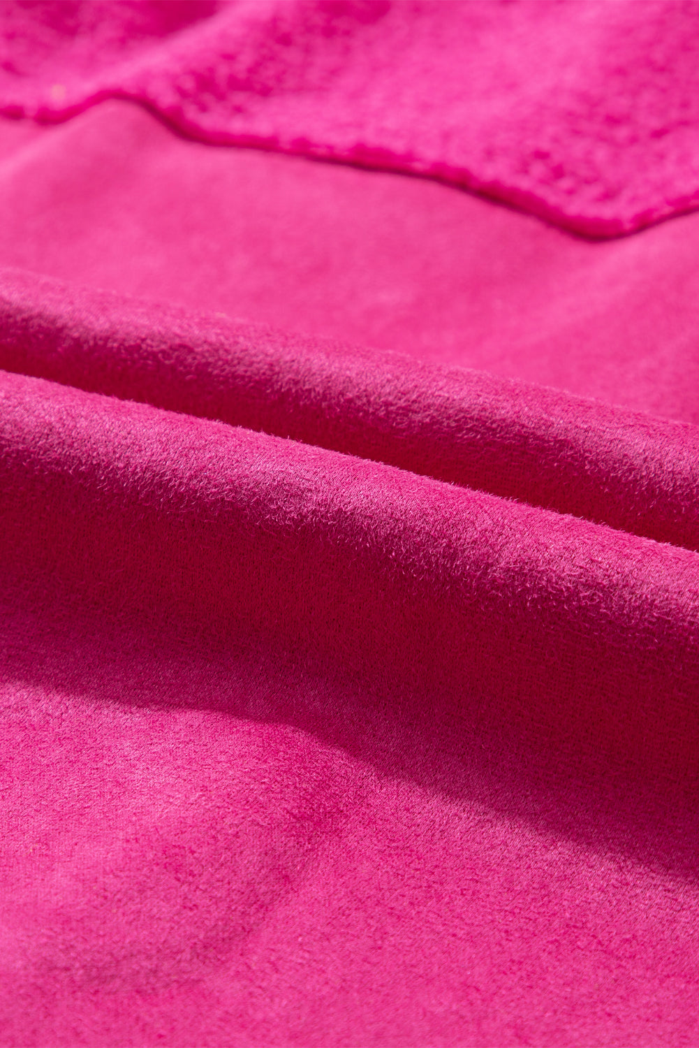 Shacket abbottonate per patchwork in sherpa in cambio rosa brillante