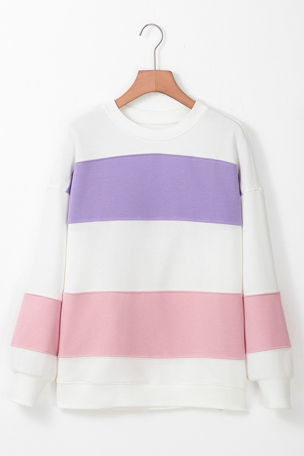 Sudadera beige con cuello redondo y hombros que caen en bloque de color de retazos