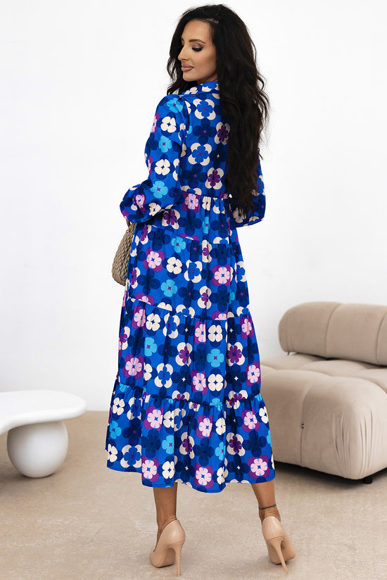 Robe mi-longue bleue à fleurs et manches paysannes à volants et volants