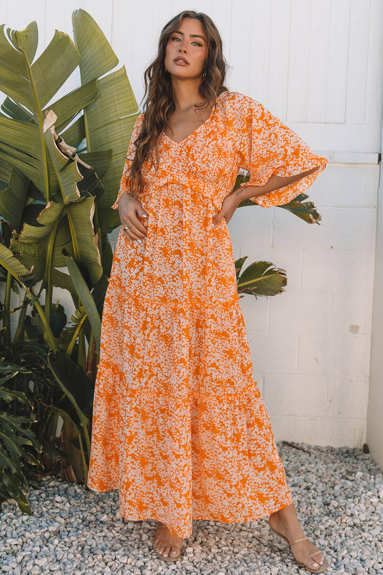 Robe longue smockée à imprimé floral orange*