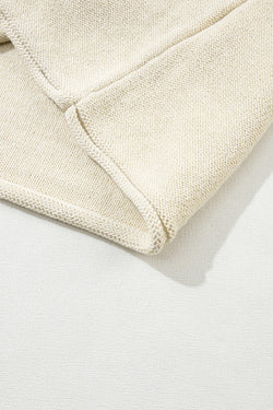 Tricotted sweater with short sleeves *