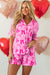 Pink pajama set with half-long sleeve shirt and node print shorts