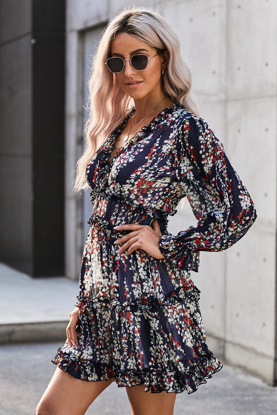 Blue floral dress with ruffles and open back