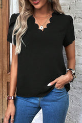 Driven black top with V -neck and petal sleeves