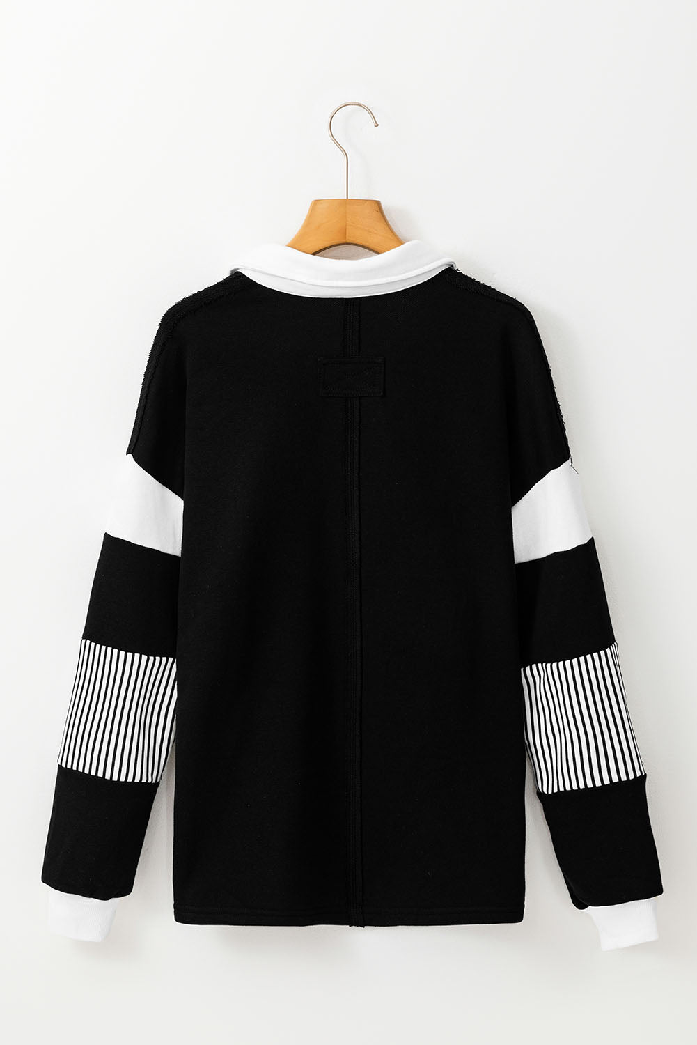 Sweat-shirt noir à rayures color block *